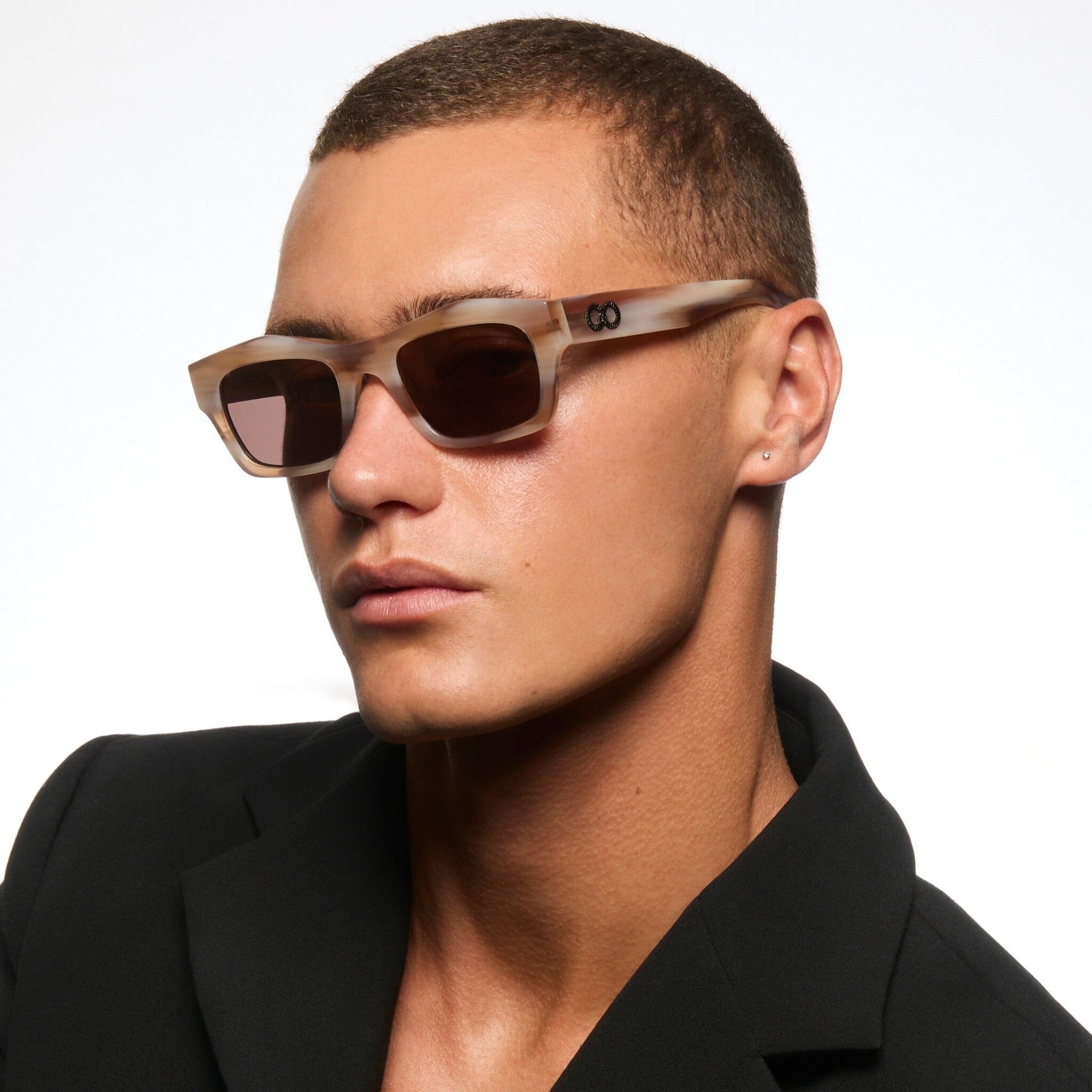 Defined by the bevelled brow.