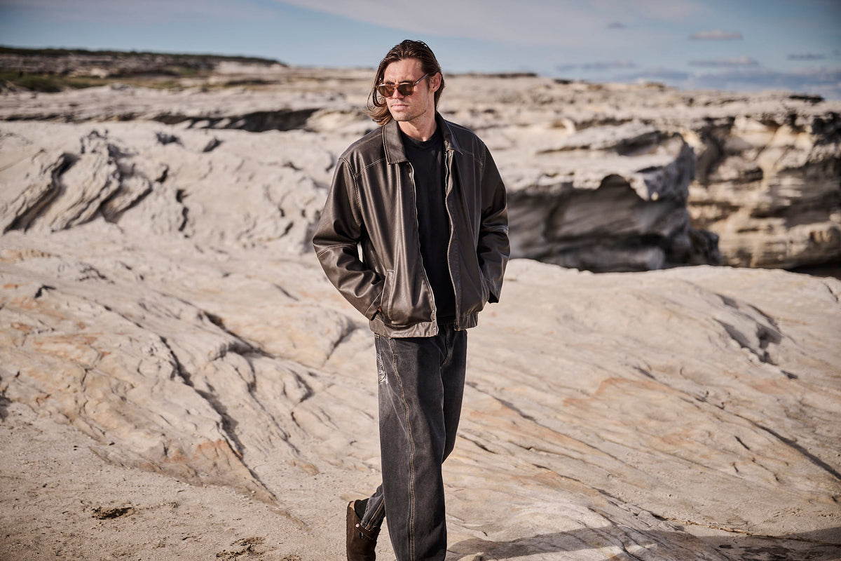 Kipp Caddy wearing Childe Eyewear on the coast