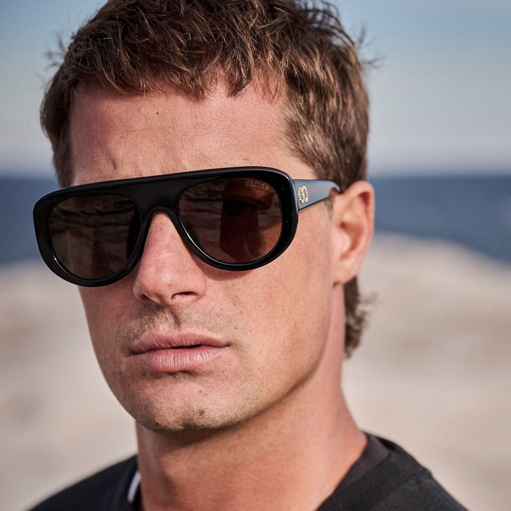 PHASE Gloss Black | Amber Bio Lens